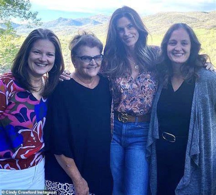 Girl power: Cindy Crawford shared a very rare image with her look-alike sisters Chris and Danielle as well as her mother Jennifer Sue Crawford-Moluf on Tuesday